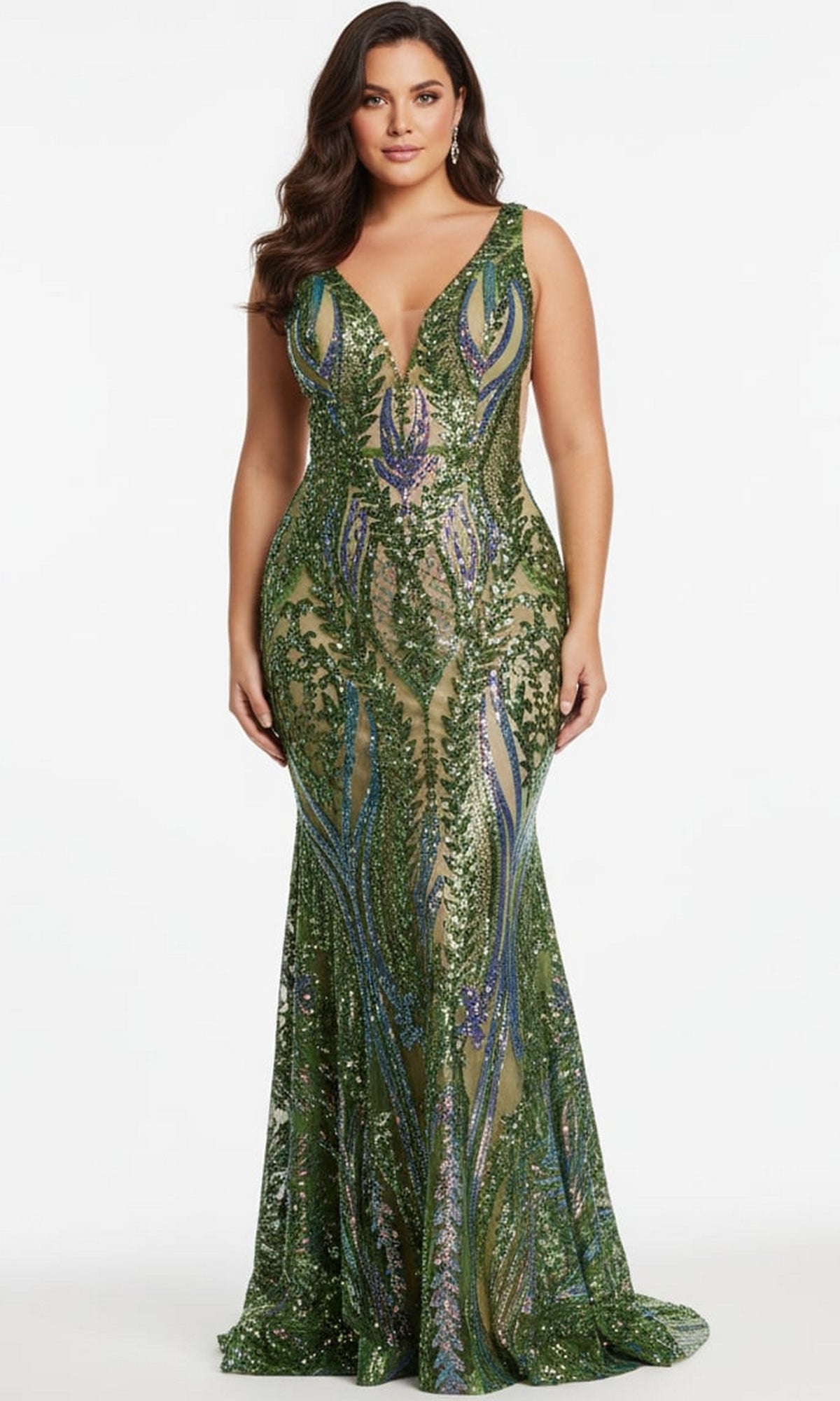 A woman wearing a plus-size Sequin Jovani Plus-Size Prom Dress, a floor-length, green sequined gown with a V-neckline and sheer side panels.